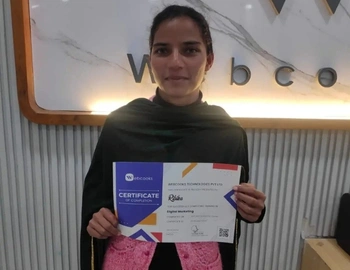 Webcooks director proudly giving certificate  to Ribika in Digital Marketing course