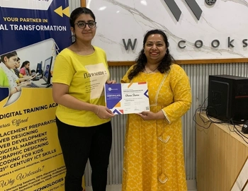 Priya receiving the certificate after completing the Digital Marketing course. 