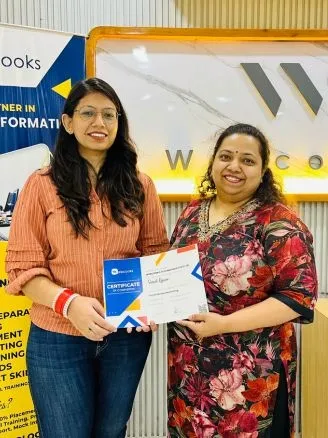 Simratpal kaur Receiving Certificate in web designing course, focusing on practical implementation and real-world experience through project-based assignments